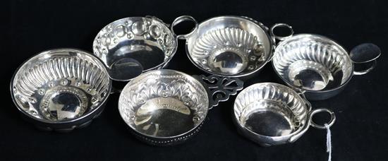 Four assorted French silver taste vin, a sterling taste van and one other taste vin.